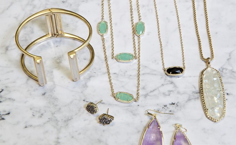 assorted jewelry on marble counter